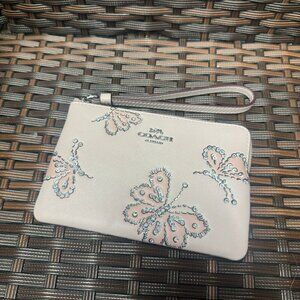 coach Corner Zip Wristlet With Sparkly Butterfly Print ccj72